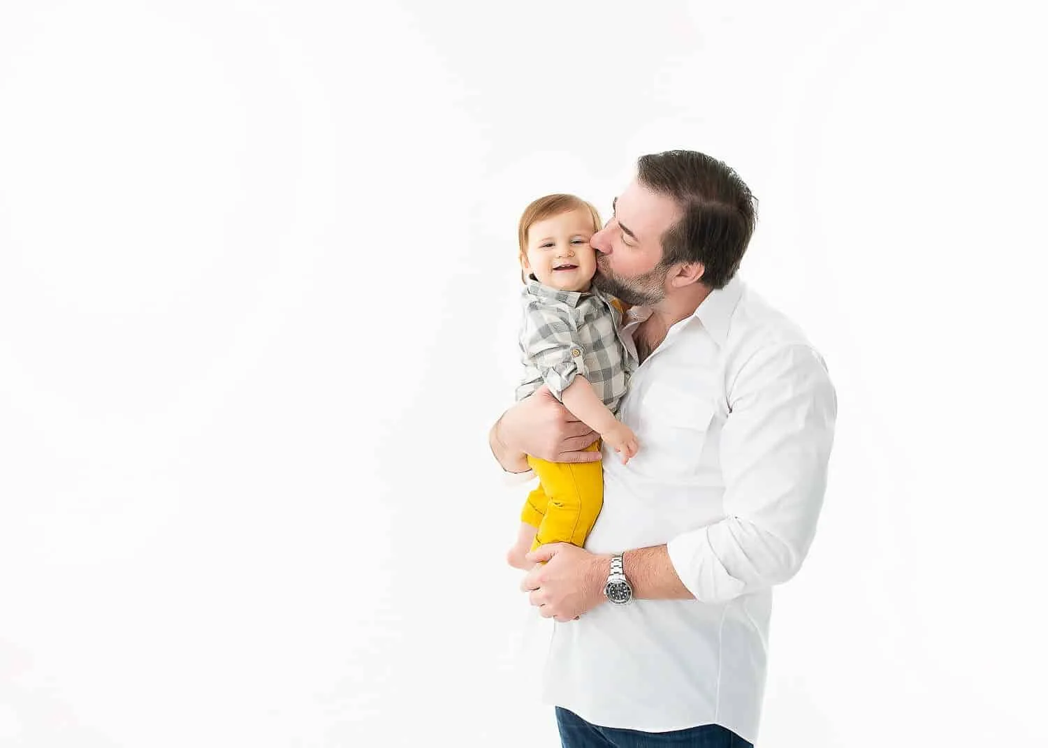 Austin Family Photographer 14 Man holding baby during family session - Zesty Orange Photography by Olesya Redina