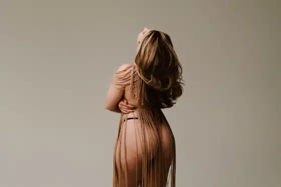 boudoir shoot | What Does Retouching Mean in Boudoir Photography | Should I Lose Weight Before My Boudoir Session | corsets hosiery non traditional wardrobe