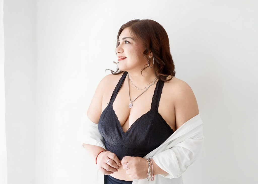 Soft and confident window-lit boudoir portrait by Austin boudoir photographer