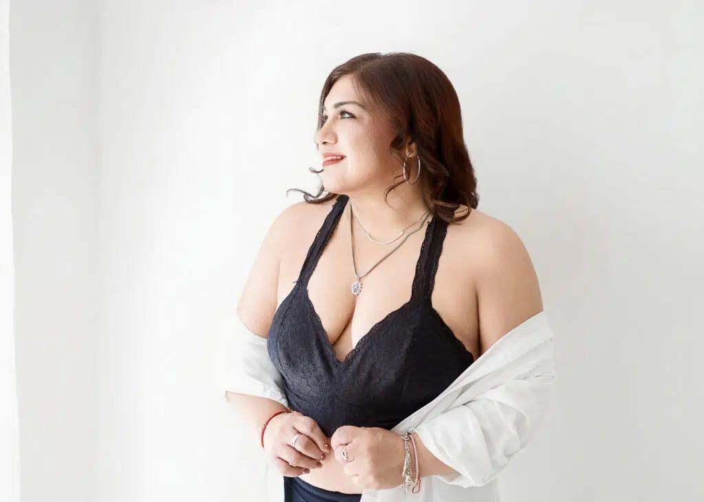 Soft and confident window-lit boudoir portrait by Austin boudoir photographer